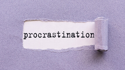 The text PROCRASTINATION appears on torn lilac paper against a white background.