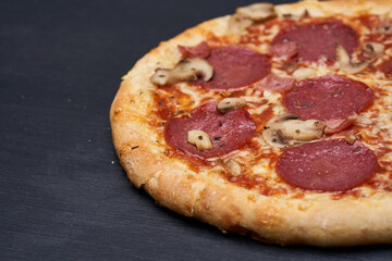 Delicious pizza on wooden board