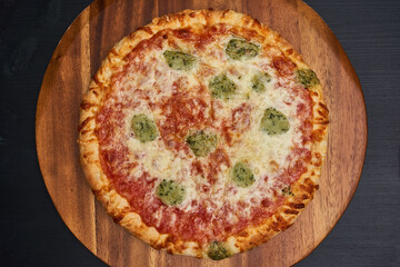 Delicious pizza on wooden board
