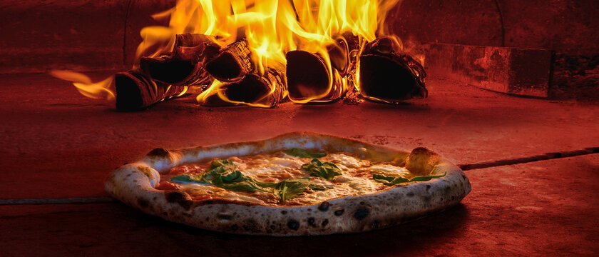 wide image cover photo traditional wood fired pizza oven pizzeria inside 