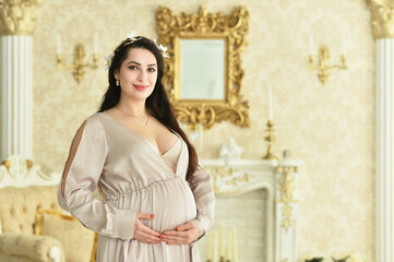 Fototapeta premium Beautiful pregnant woman