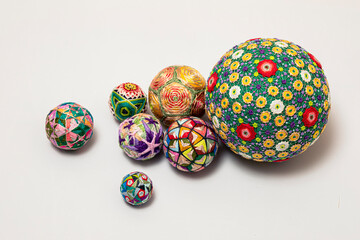 Temari balls, a handicraft ball in traditional Japanese style. Japanese culture. Closeup Christmas gift.