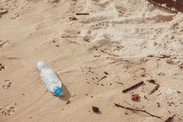 Plastic bottles on the beach pollution in ocean Environment concept