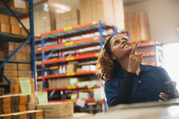 Portrait of African American worker in warehouse, International export business concept, occupation...