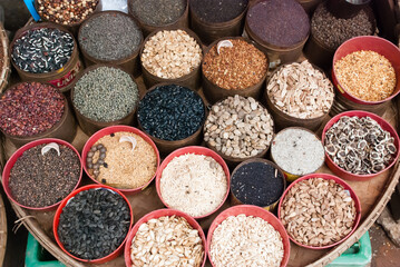 Seeds and spices in bulk at a market in Myanmar (Burma), Asia