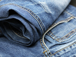 Fototapeta premium Blue jeans top on black background