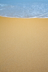 Fototapeta na wymiar Sand and wave in ralax day at Thailand