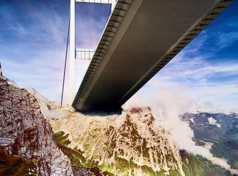Bridge in the sun, composite photo of the Alps in Bavaria with a bridge in Istanbul