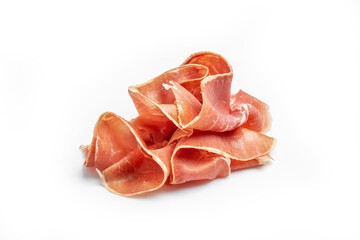 Slices of appetizing jamon. Raw ham. Isolated on white background