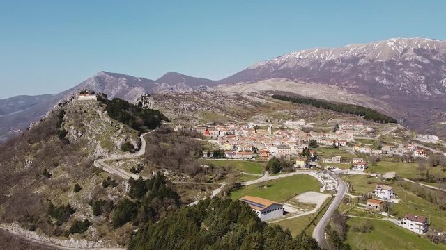 Aerial panoramic landscape view of Pietraroja, a hill top village in Italy, in the Apennines