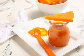 Composition with healthy baby food and ingredients on light background, closeup