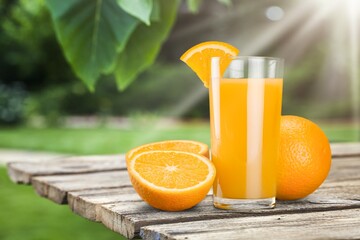 Orange juice in glass and slices of orange fruit © BillionPhotos.com