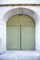 Front entrance door leading to a house in Italy