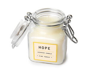 Wax candle in jar on white background
