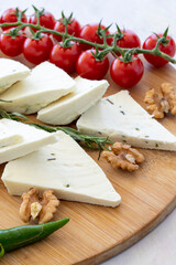 Close-up herb cheese on wooden background