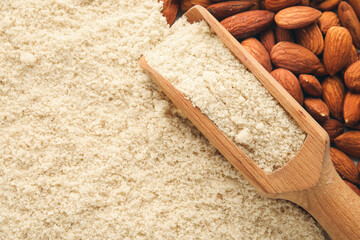 Scoop with almond flour and nuts, closeup