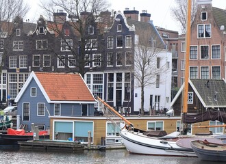 Amsterdam Historic Houses with Boats and Houseboat