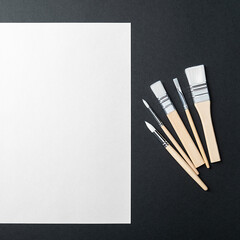 The sheet is pure white and the paint brushes are on a black background with a place to copy.