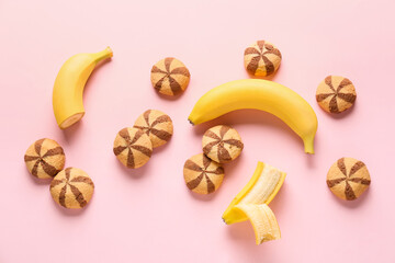 Fototapeta na wymiar Composition with tasty cookies and bananas on color background
