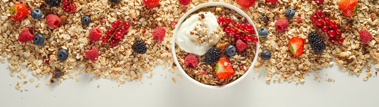 Bowl of muesli with berries and yogurt