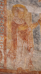 Virgin Mary standing with lifted hands, a pice of romanesque art
