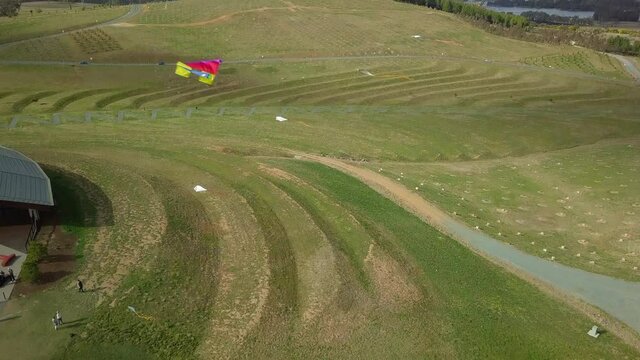 Aerial Tilt Down: Kites Flying Over National Arboretum Canberra