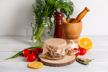 Homemade canned fish from mackerel in oil. Glass jars with canned fish