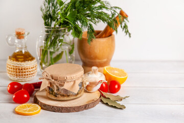 Homemade canned fish from mackerel in oil. Glass jars with canned fish