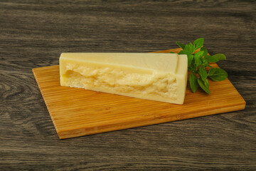 Hard parmesan cheese served basil