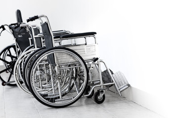 Fototapeta na wymiar Wheelchair, a chair with wheels for disability people and hospital illness injury patient care.