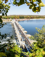 View of a dam from high on the hill above