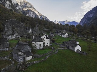 Aerial panorama view of historic stone rock houses in Sabbione village Bavona Valley Vallemaggia...