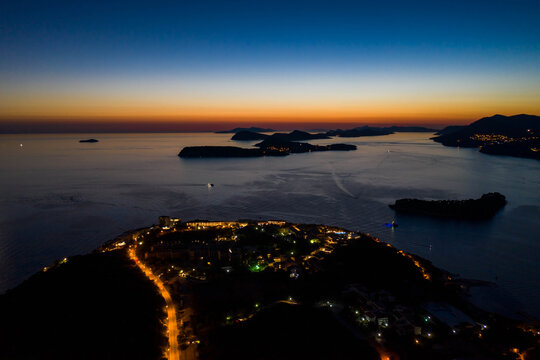 Aerial drone shot of post sunset over Adriatic sea view from Babin Kuk hill in Dubrovnik Croatia summer