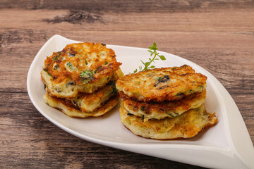 Zucchini pancakes with herbs and spices