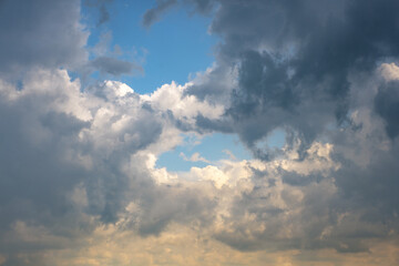 Beautiful stormy cumulus clouds in the sky, background.