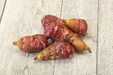 Raw topinambur root or Jerusalem artichoke