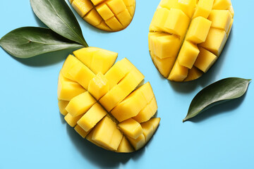 Sweet cut mangoes on color background, closeup