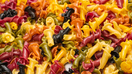 Multicolored pasta variety background.