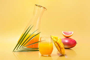 Composition with glass of tasty mango margarita on color background