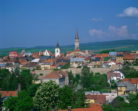 Houses and churches on the skyline of the town of Levoca, with countryside behind, in Slovakia