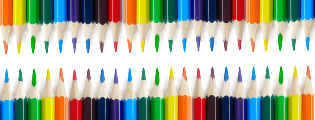 Fototapeta premium pencils isolated on white background with copy space. School and creative painting concept with colored pencils. Back to school banner. packaging template for colored pencils, notebooks and holder