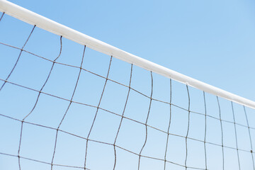 volleyball or tennis net on a background of blue sky