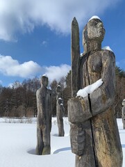 pagan wooden Chuvash idol man with sword in winter
(Baskaki, Chuvashia Republic, Russia)