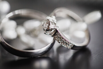 gold wedding rings on an abstract background with copy space