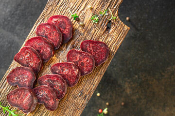 horse meat mahan dry-cured sausage or beef snack healthy meal top view copy space for text food...