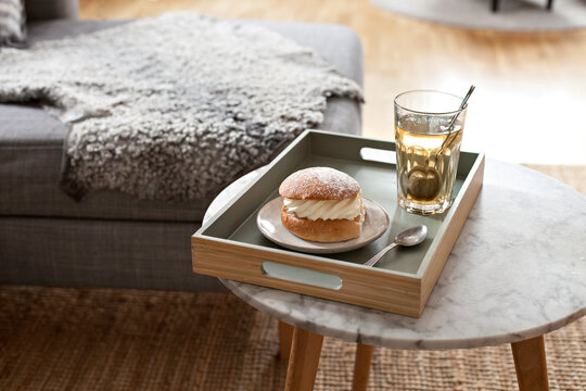 Brick on marble table with Swedish Dessert Semla