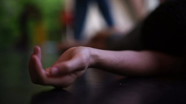 dancer close-up somatic hand low view