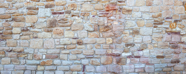 Modern Pattern Natural Wall of sandstone. Natural Decorative Stacked Stone Wall Texture. Natural Stone cladding.
