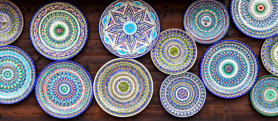 Ethnic Uzbek ceramic round plates with traditional ornaments