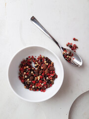 Mix of peppers on gray background